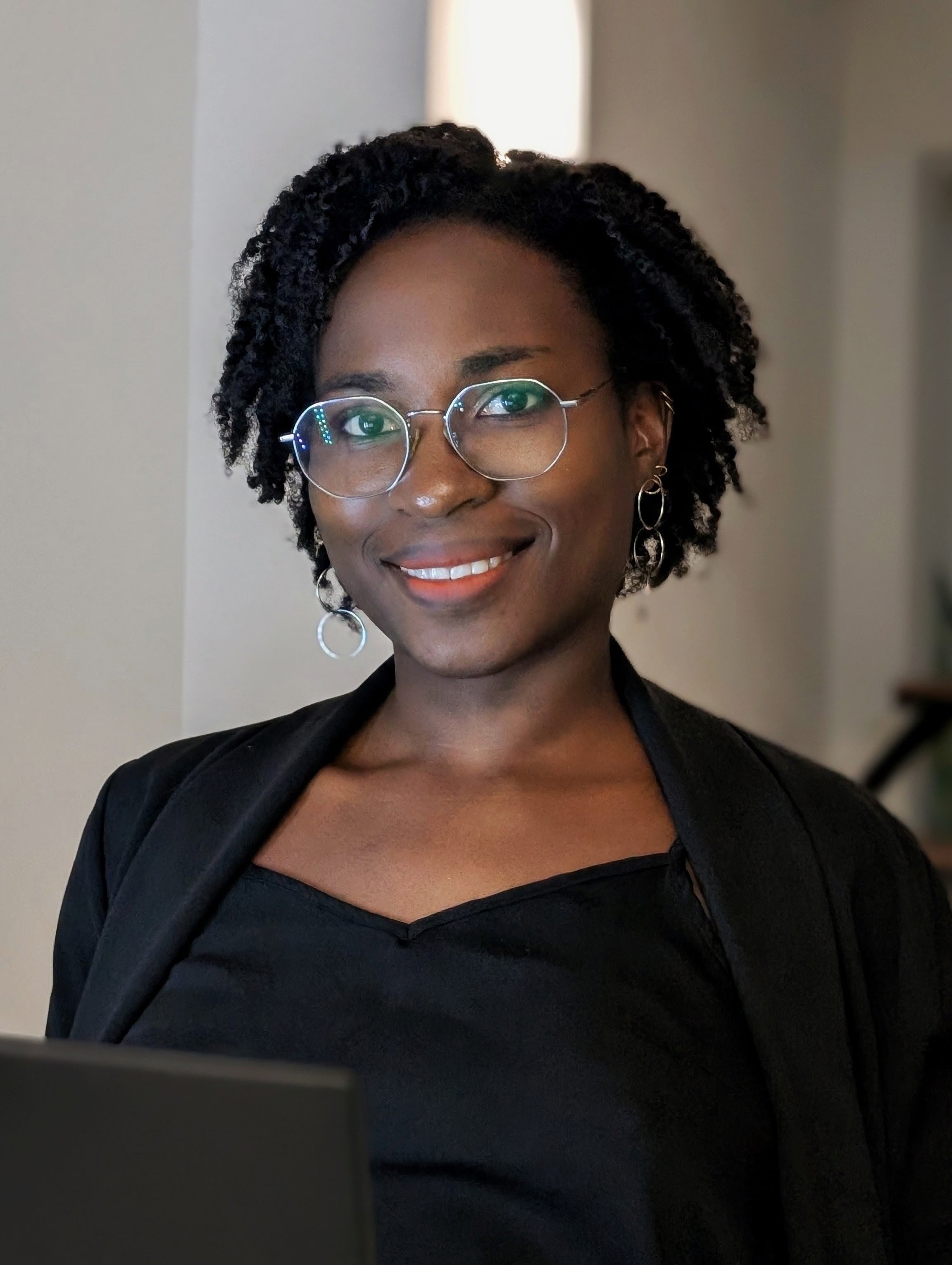 Portrait of Marie Mifoumou, Co-founder of Genesis Risk Monitor